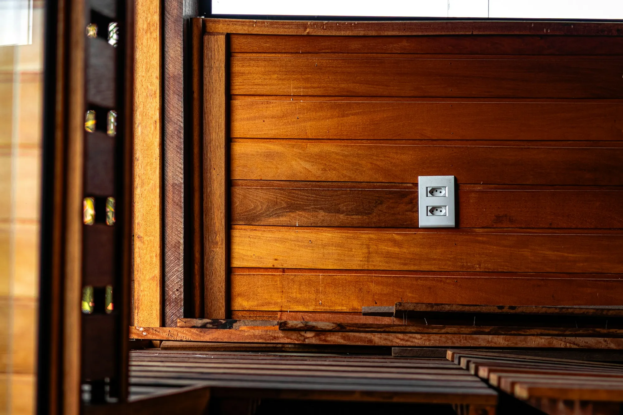 Electrical outlet and switch on a wall