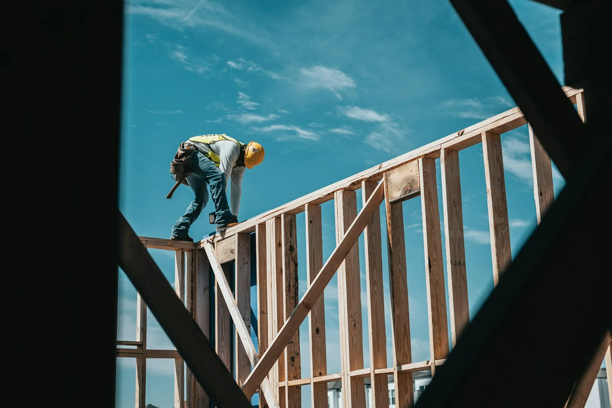 Wooden house frame under construction